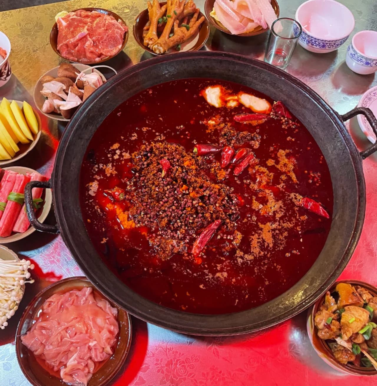 A hot pot meal photographed at a restaurant in Chengdu