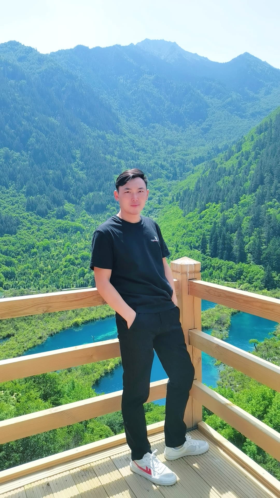 Lichun Cai, a Sichuan route specialist at a mountain scenic area